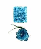 Feest blauwe deco bloem met speld elastiek