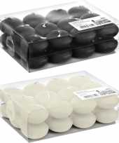Feest drijfkaarsen pakket van 48 stuks zwart en ivoor wit